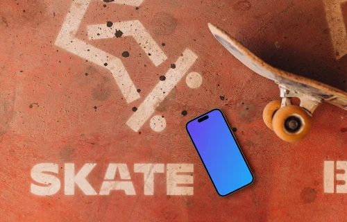 iPhone mockup next to the skateboard