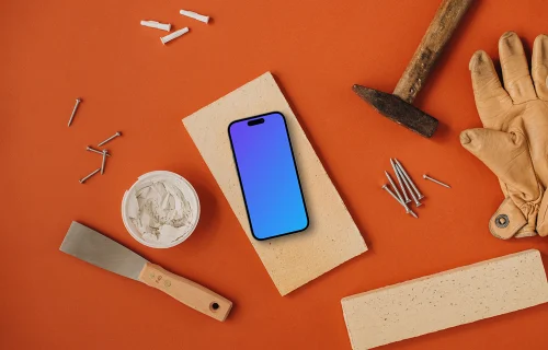 iPhone mockup with workshop tools