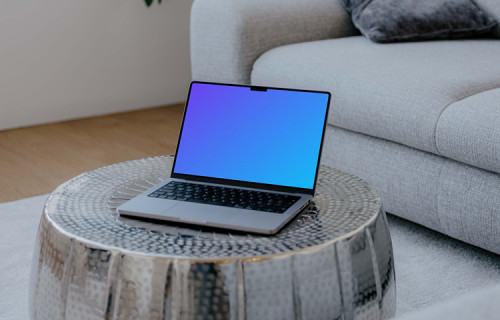 Laptop mockup on the silver table