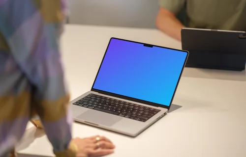 MacBook Pro 14 inch mockup on office desk with space for design