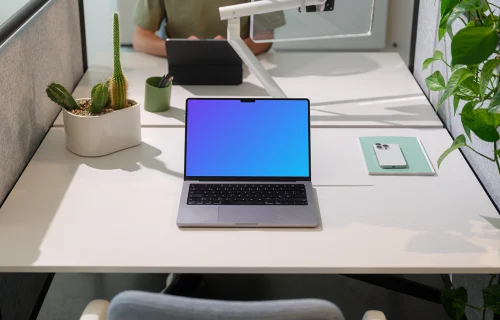 MacBook Pro 14 mockup in a modern office