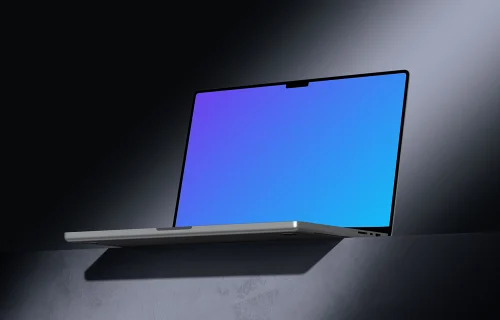 MacBook Pro 16 inch mockup on a textured tabletop with dramatic lighting