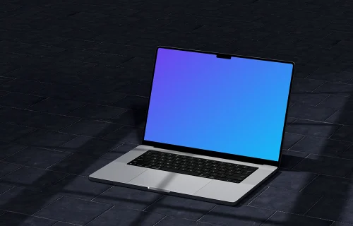 MacBook Pro 16-inch mockup on dark tile floor