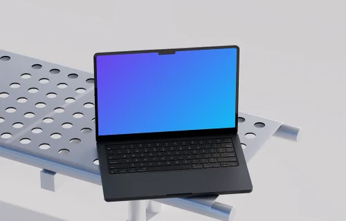 MacBook Pro mockup on a modern metal bench