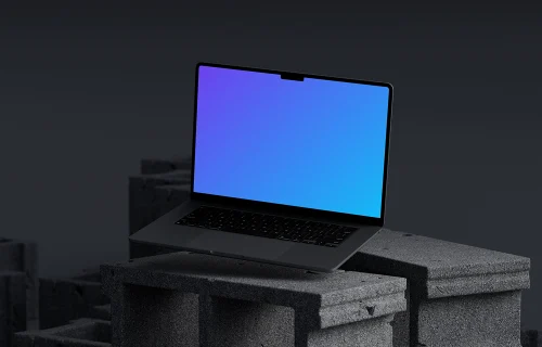 MacBook Pro mockup on a textured concrete setup