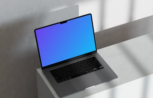 MacBook Pro mockup on marble with dynamic shadows