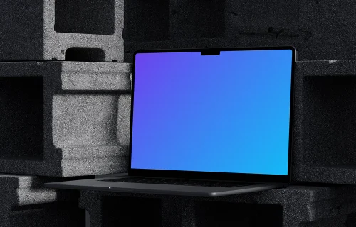 MacBook Pro mockup placed up on concrete blocks