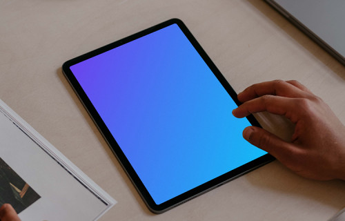 Male hand pointing on tablet mockup
