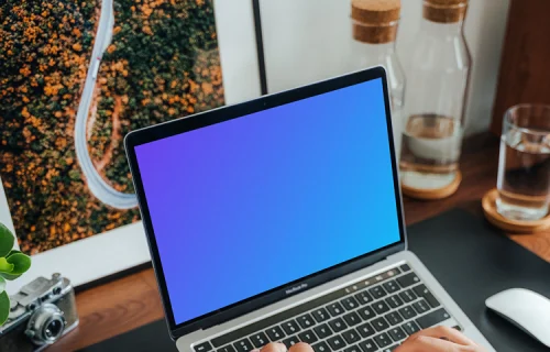 Male hands working on a MacBook Pro 13 mockup