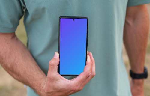 Male trail runner holding a smartphone mockup