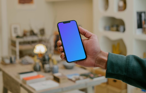 Man holding a smartphone mockup