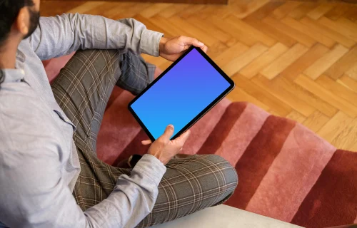 Man holding a tablet in the office