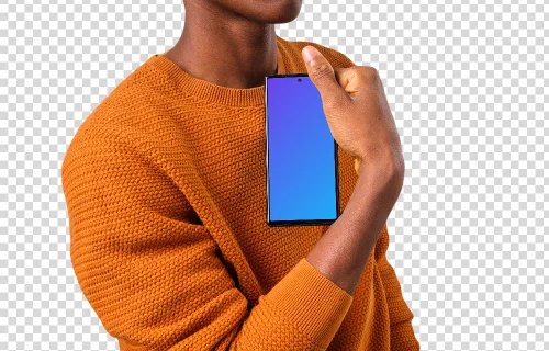 Man in orange sweater holding Google Pixel mockup in one hand