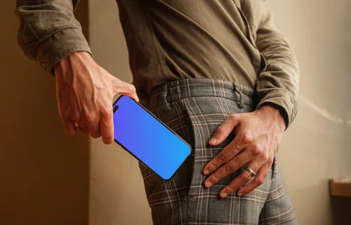 Man putting out of his pocket a iPhone mockup