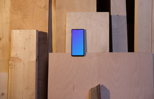Mockup of Google Pixel 6 placed on wooden boards