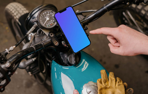 Motorcycle rider using an iPhone 13 Pro mockup 