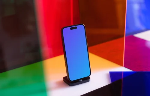 Multicolored background behind a iPhone 14 Pro mockup