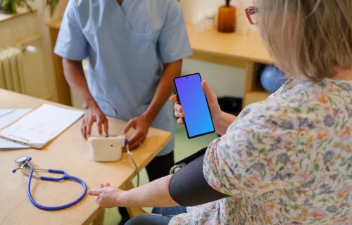 Patient holding a Google Pixel mockup