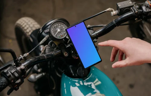 Person using a Pixel 6 mockup on a motorcycle