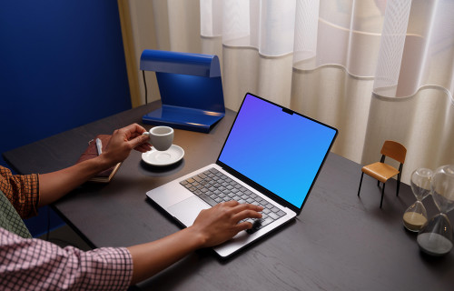 Person working on a MacBook Pro mockup