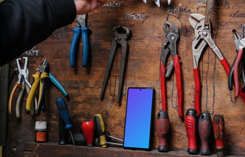 Pixel 6 mockup leaning on a tool rack
