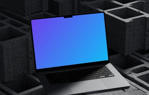 Sleek MacBook Pro displayed on industrial concrete blocks