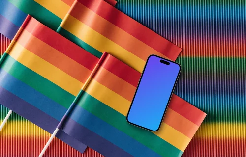 Smartphone mockup laying on pride flags