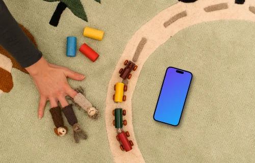 Smartphone mockup on a kid's playmat with toys