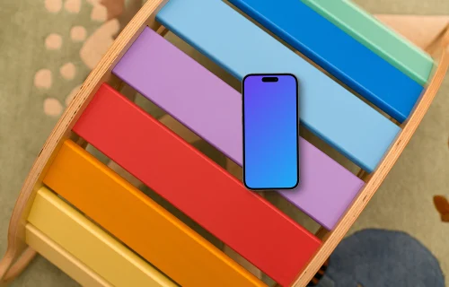 Smartphone mockup on colorful child's play table