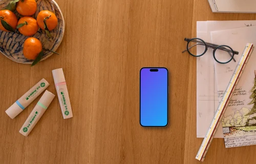 Smartphone mockup with architect's tools and decor