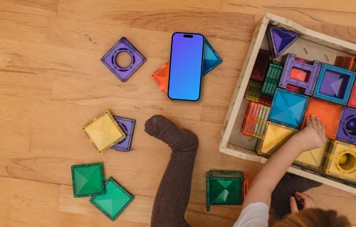 Smartphone mockup with colorful children's blocks