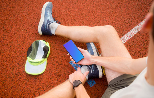 Sport mockup with athlete holding a phone