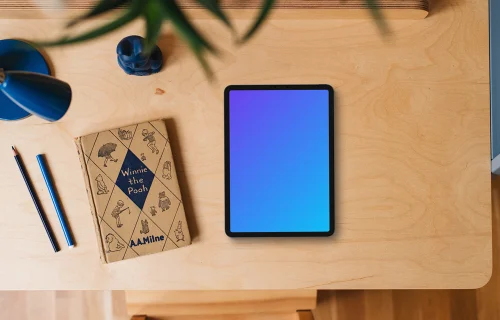 Tablet mockup on a child's wooden desk