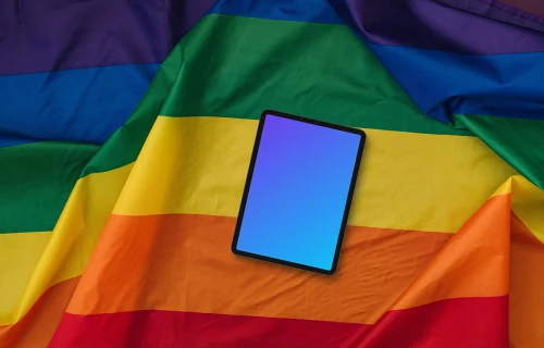 Tablet mockup on a large pride flag