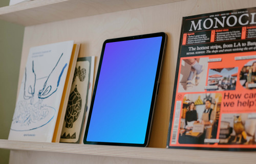 Tablet mockup on bookshelf