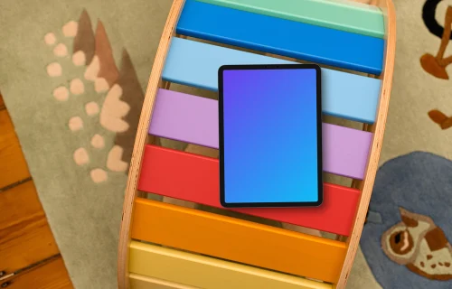 Tablet mockup on colorful children's bookshelf