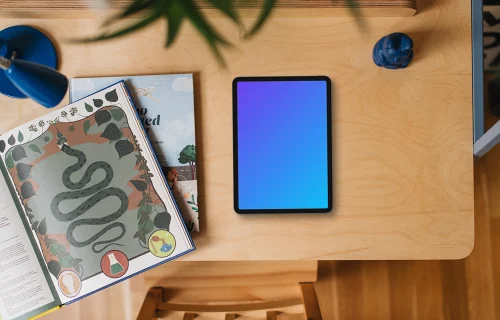 Tablet mockup on kid-friendly creative table