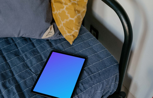 Tablet mockup placed on a bed