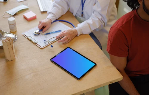 Tablet mockup placed on the doctor’s table