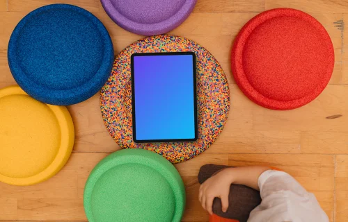 Tablet mockup surrounded by colorful sitting pads