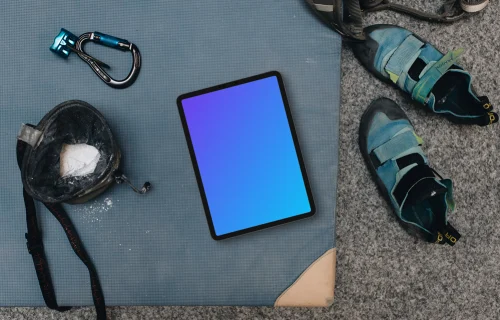 Tablet mockup with climbing equipment