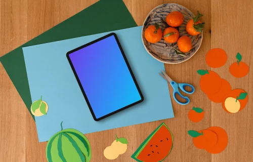 Tablet mockup with colorful fruit paper cutouts for kids