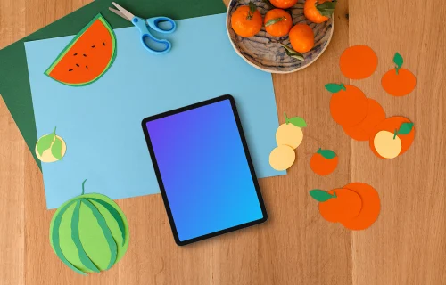 Tablet mockup with colorful fruit paper cutouts