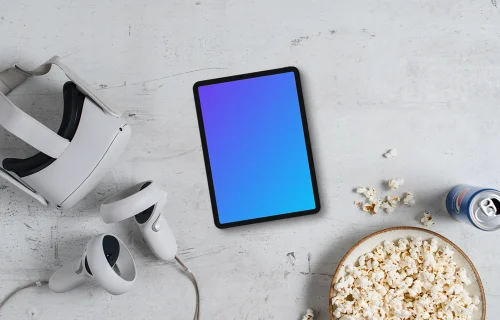 Tablet mockup with VR gear and gaming accessories