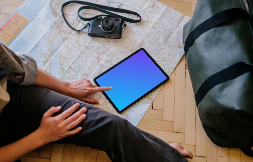 User typing on an iPad Air mockup