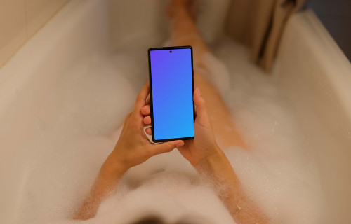 Woman hands holding a Google Pixel 6 mockup