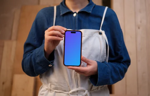 Manos de mujer sosteniendo un iPhone mockup