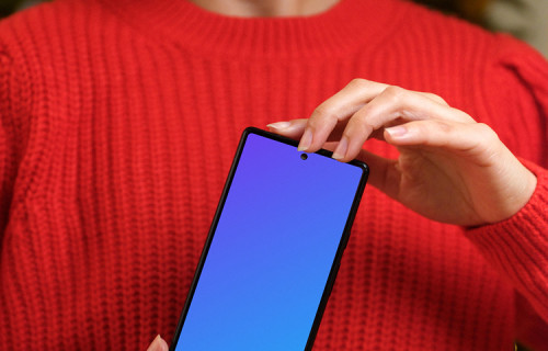Woman in red sweater holding a Google Pixel 6 mockup