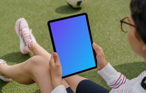 Woman looking at the iPad Air mockup