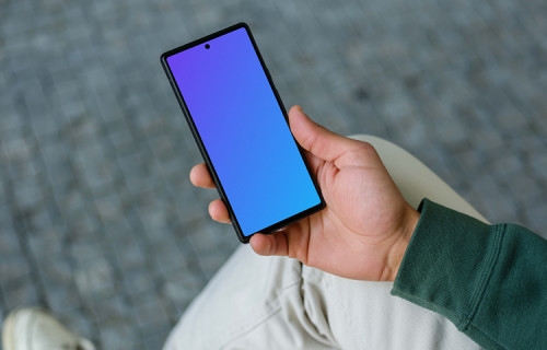 Young man reading on Google Pixel 6 mockup